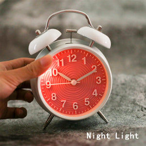 Topkey 4” Twin Bell Alarm Clock Non-ticking Bedside Table Travel Clock Vintage Alarm Clock With Nightlight and Loud Alarm, Battery Operated (Not Included)
